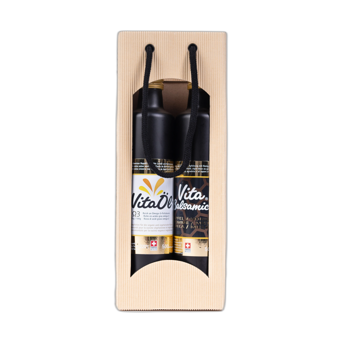 VitaÖl® und VitaBalsamico® Flaschen mit Rapsblüten und Honig