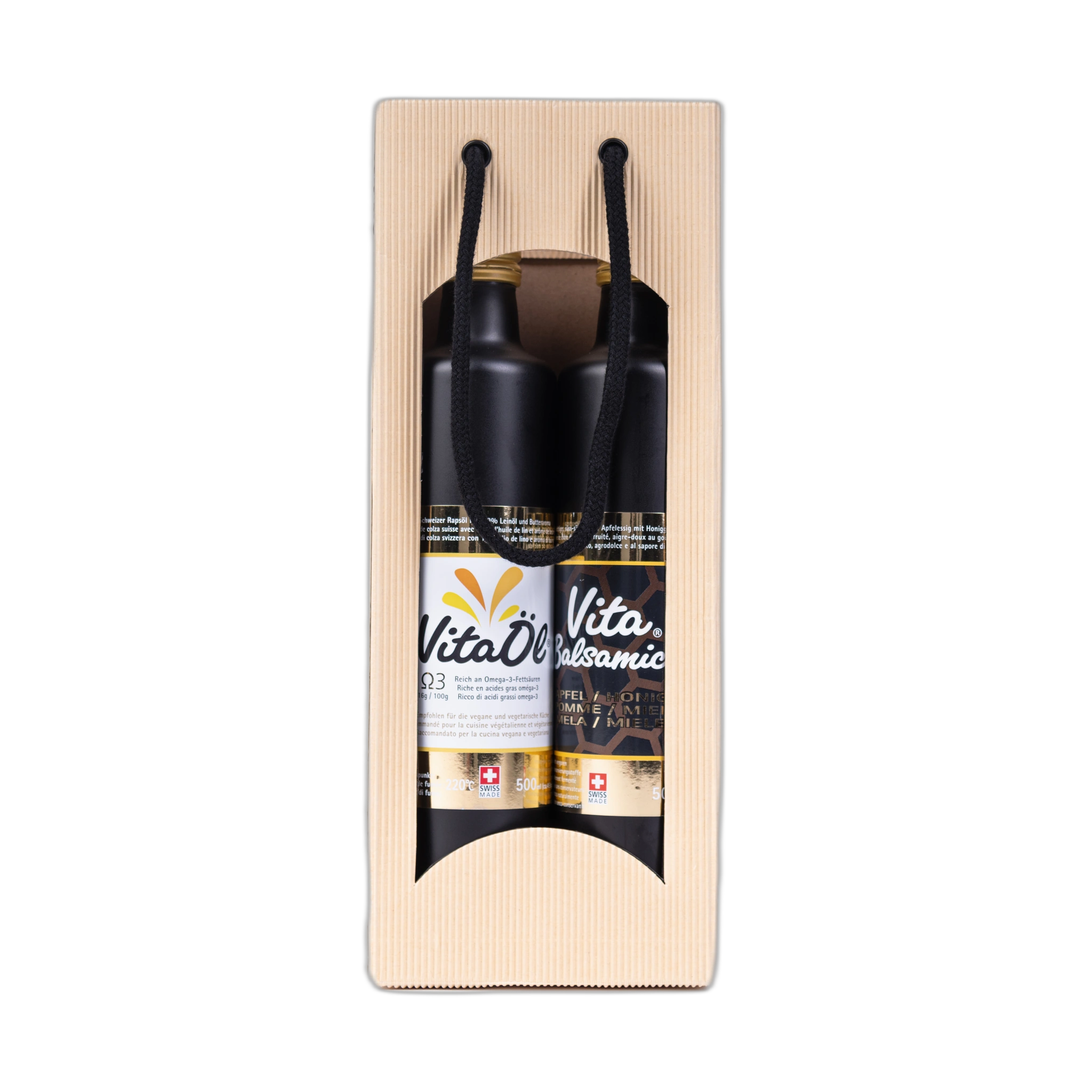 VitaÖl® und VitaBalsamico® Flaschen mit Rapsblüten und Honig